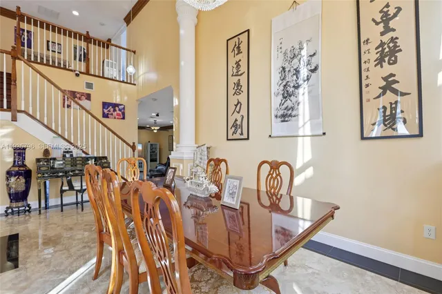a view of a dining room with furniture