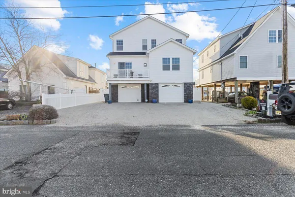 a view of a house with a street
