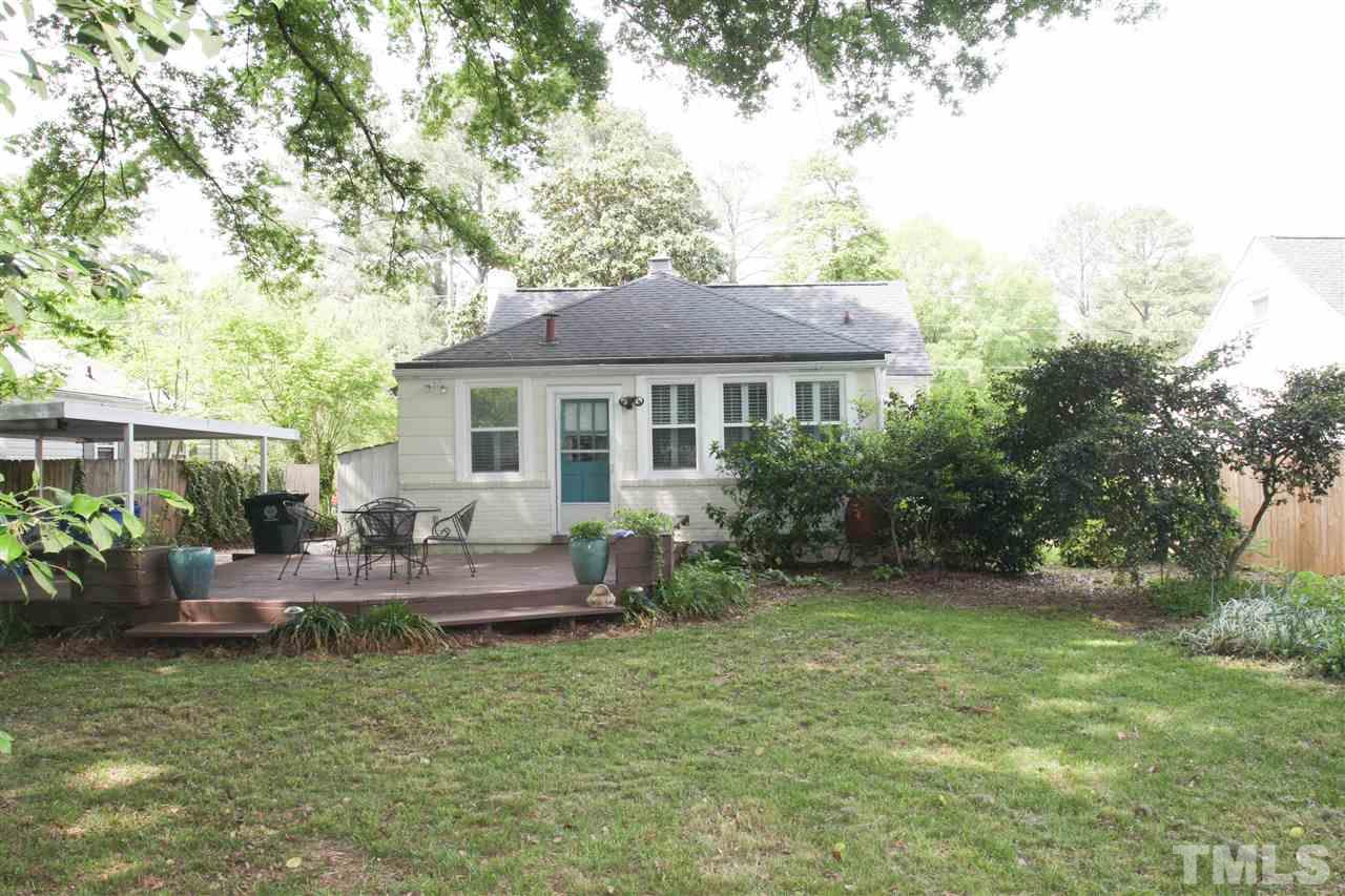 726 Kimbrough Street Raleigh, NC 27608 - Photo 18 of 18 a backyard of a house with seating space