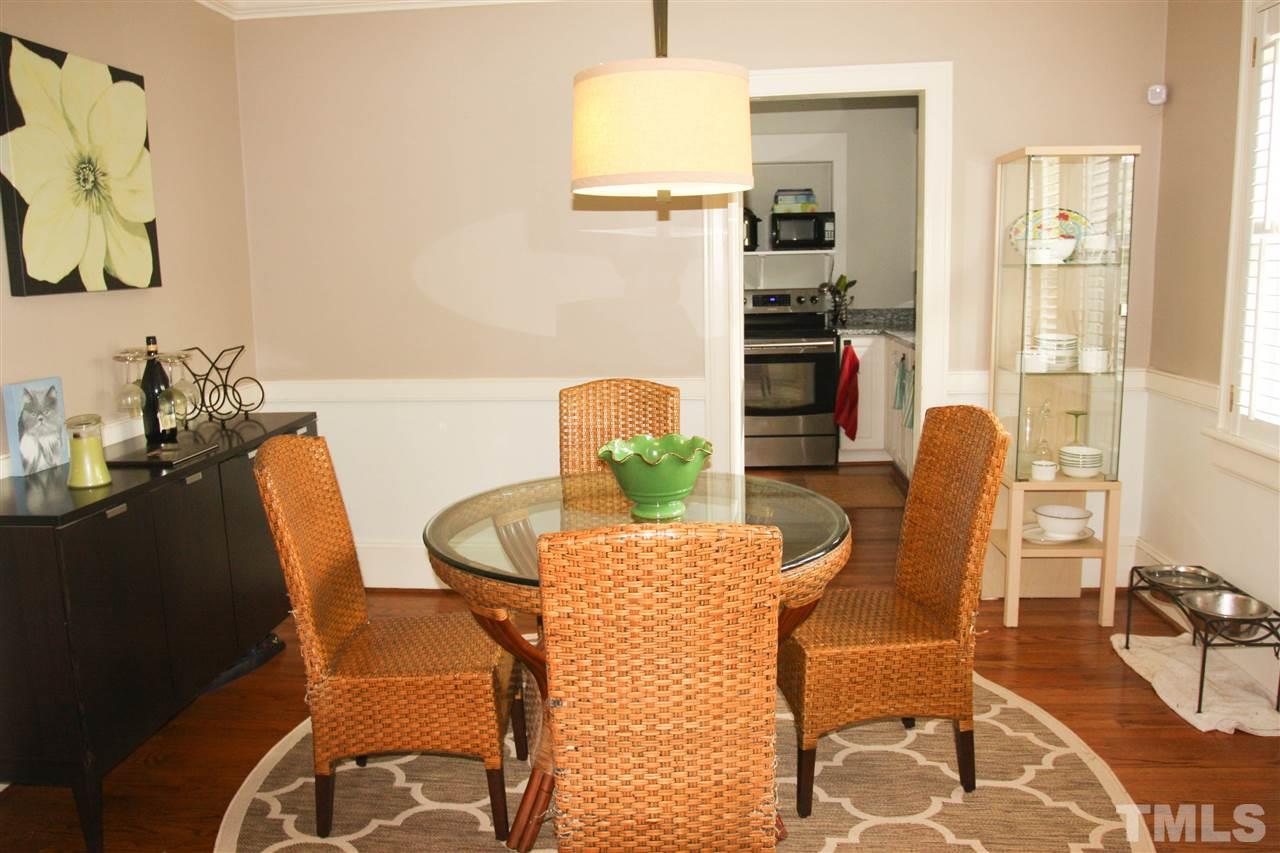 726 Kimbrough Street Raleigh, NC 27608 - Photo 5 of 18 a dining room with furniture and wooden floor