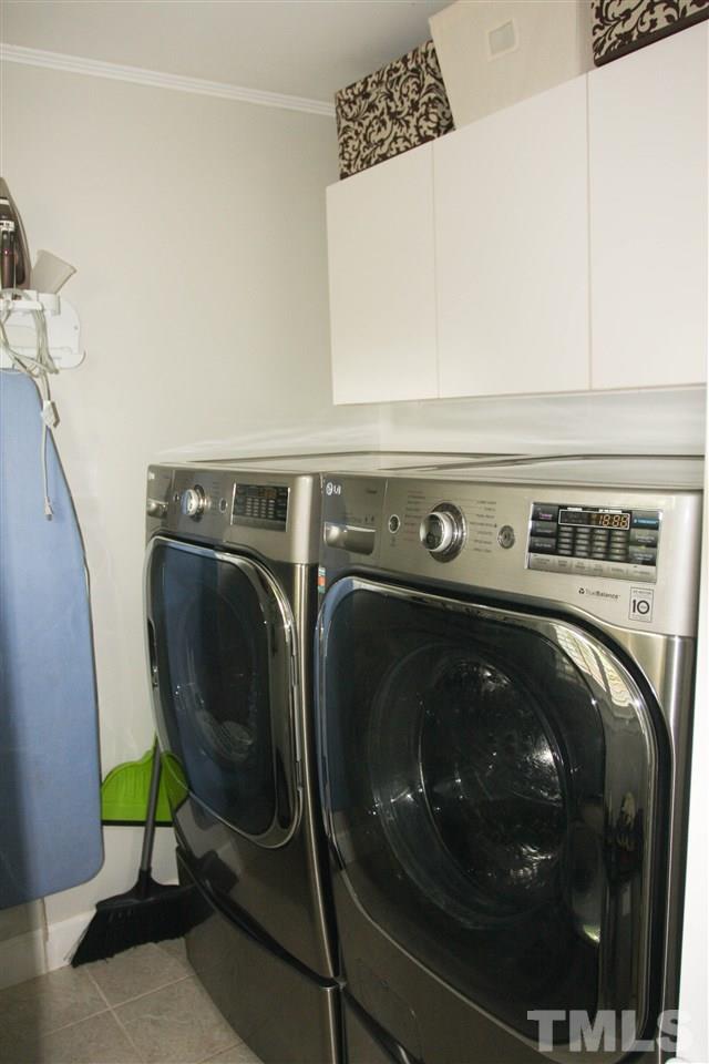 726 Kimbrough Street Raleigh, NC 27608 - Photo 9 of 18 a close up view of a washer and dryer