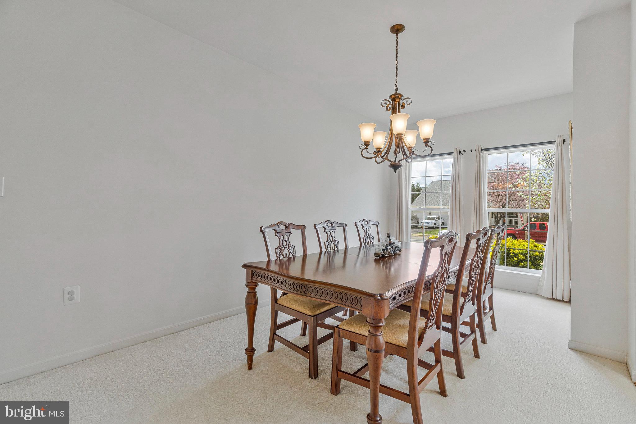159 Alpine Drive Southeast Leesburg, VA 20175 - Photo 7 of 22 a dining room with furniture and window