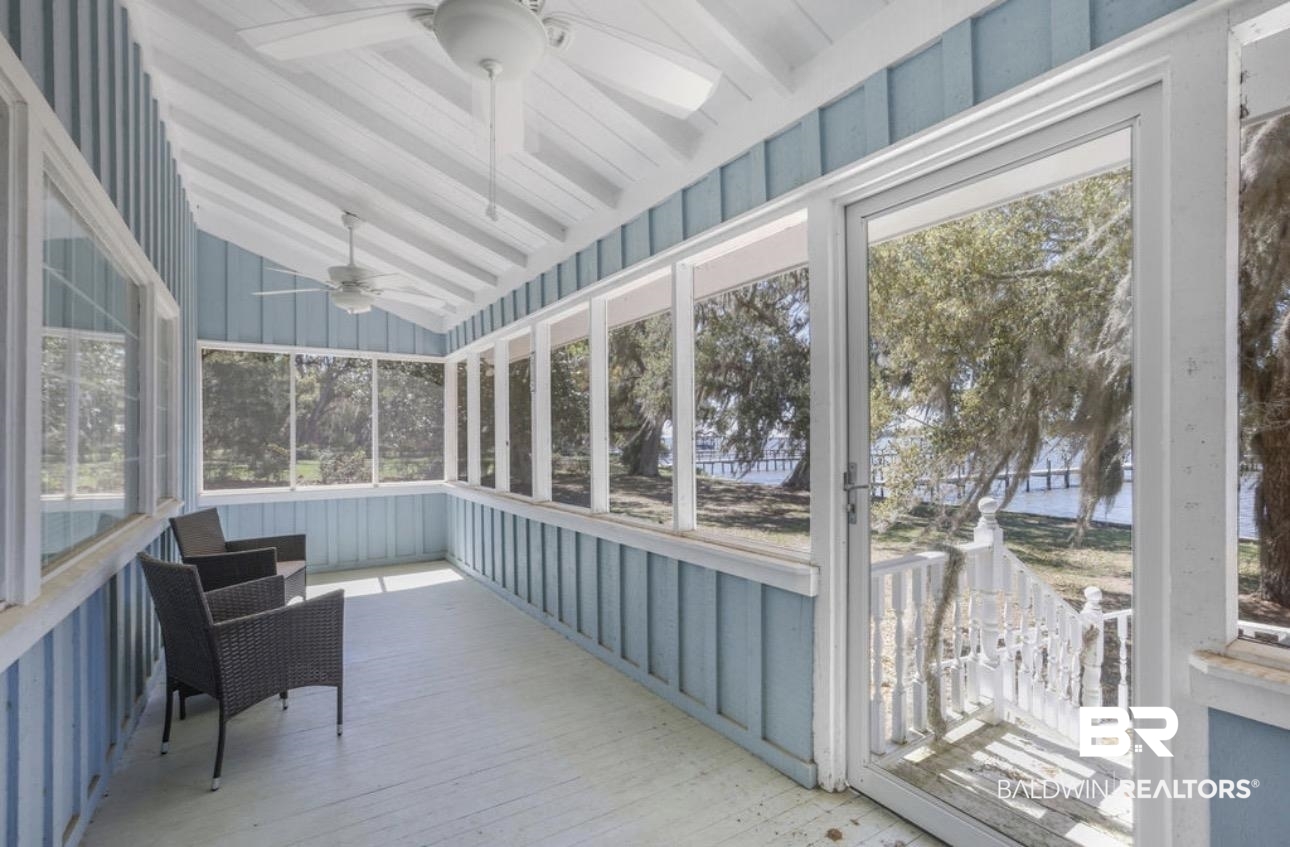 11326 County Road 26 Foley, AL 36535 - Photo 11 of 20 Sunroom featuring ceiling fan and vaulted ceiling with beams