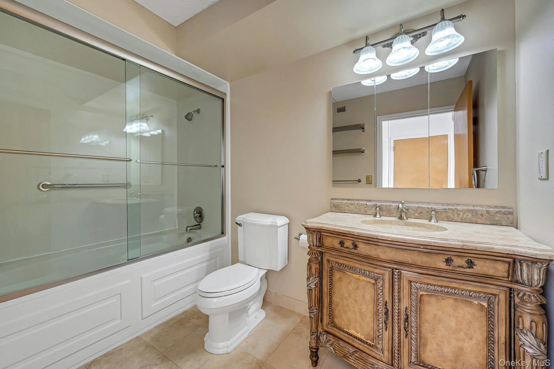 703 Pelham Road, Unit 412 New Rochelle, NY 10805 - Photo 20 of 26 Primary Bathroom has shower/tub combo.
