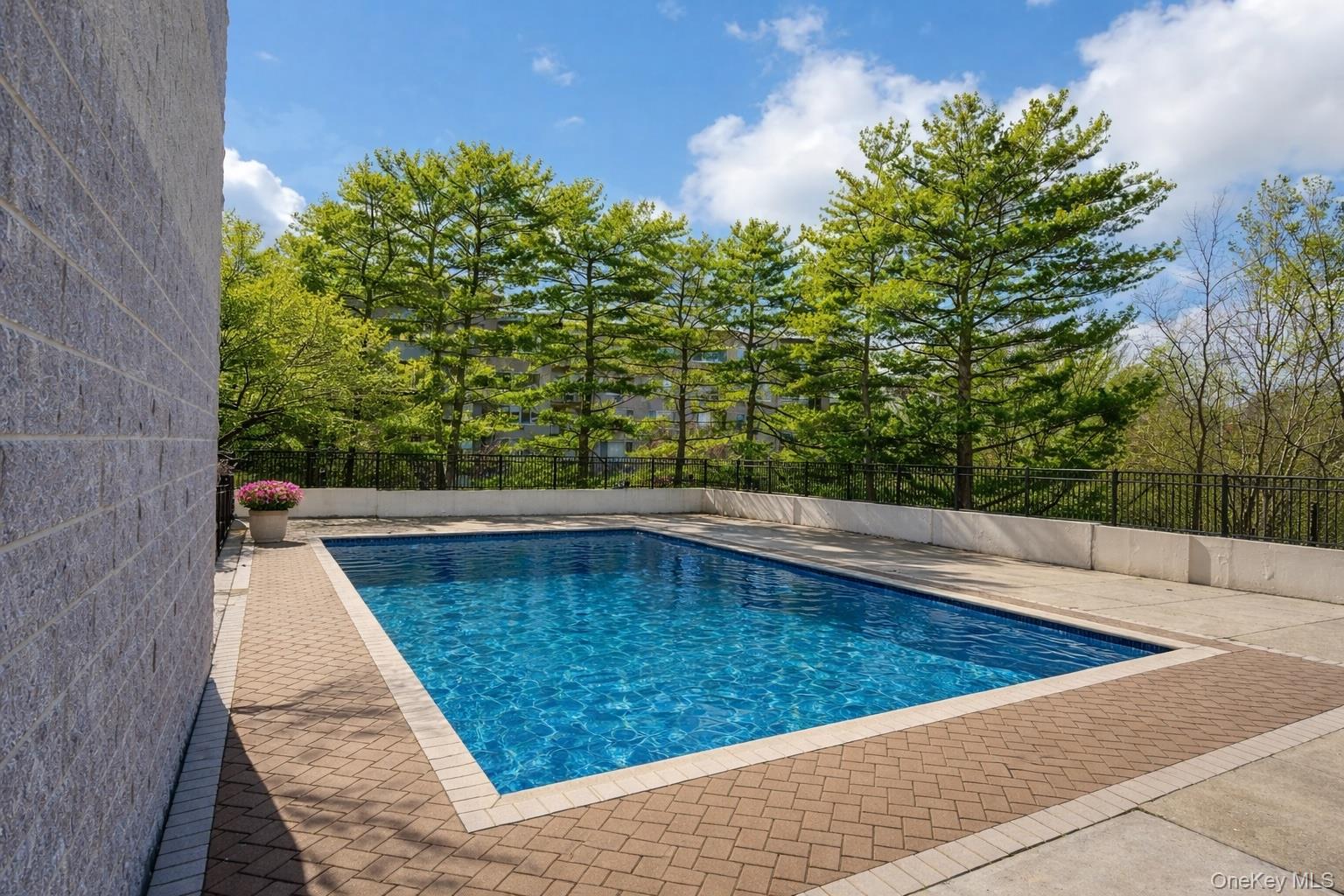 703 Pelham Road, Unit 412 New Rochelle, NY 10805 - Photo 2 of 26 The pool will open before you know it! Virtually enhanced.