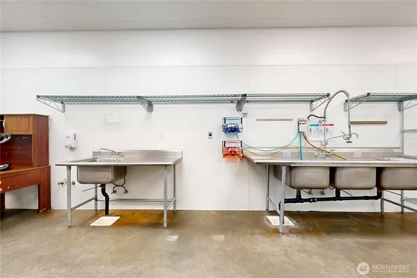 a view of a room with racks on the wall