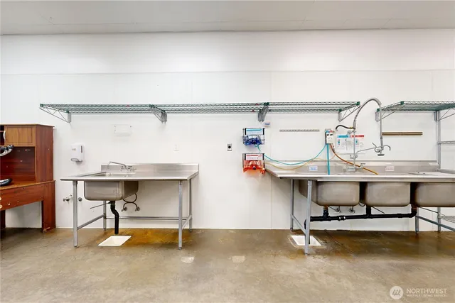 a view of a room with racks on the wall