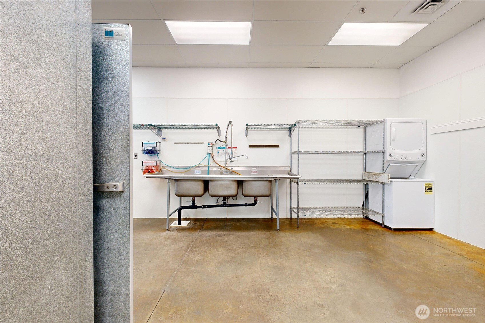 1605 Southeast Meadowbrook Street College Place, WA 99324 - Photo 17 of 30 a view of a room with racks on the wall