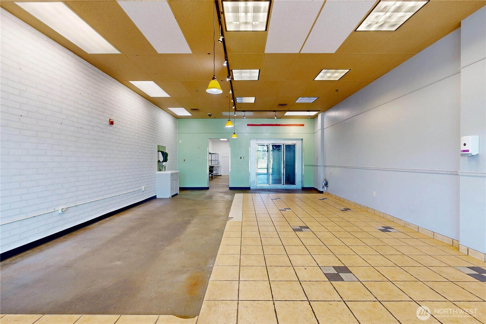 1605 Southeast Meadowbrook Street College Place, WA 99324 - Photo 2 of 30 a view of hallway with a window and chandelier