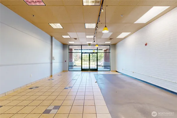 a view of an empty room and window