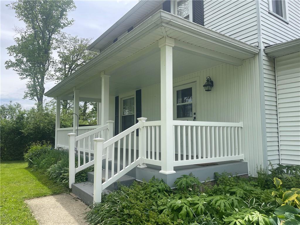 1055 East Lake Road Transfer, PA 16154 - Photo 11 of 27 a view of a house with a yard