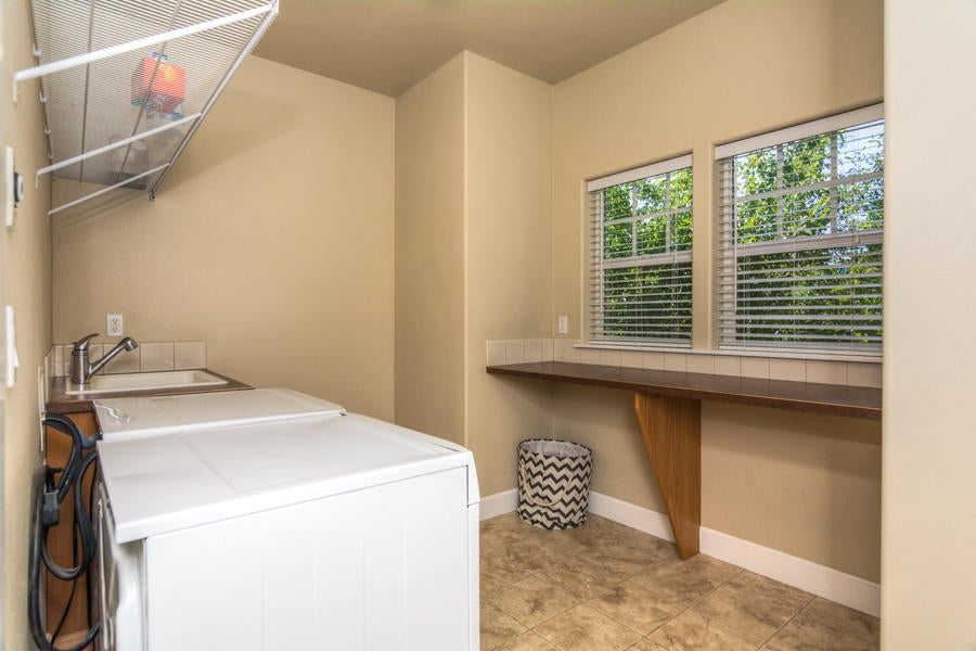 2159 Southwest 36th Court Redmond, OR 97756 - Photo 30 of 44 Spacious main level laundry room with sink.