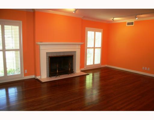 425 Peerman Place Corpus Christi, TX 78411 - Photo 2 of 10 a view of empty room with wooden floor and fireplace
