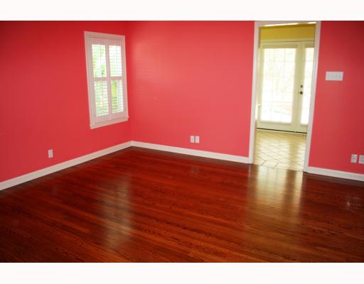 425 Peerman Place Corpus Christi, TX 78411 - Photo 7 of 10 a view of empty room with wooden floor and fan