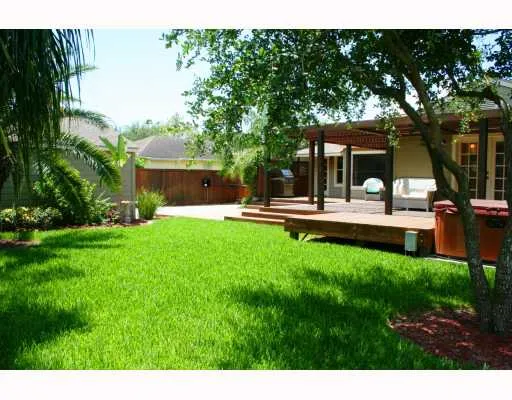 a view of a house with a yard porch and sitting area