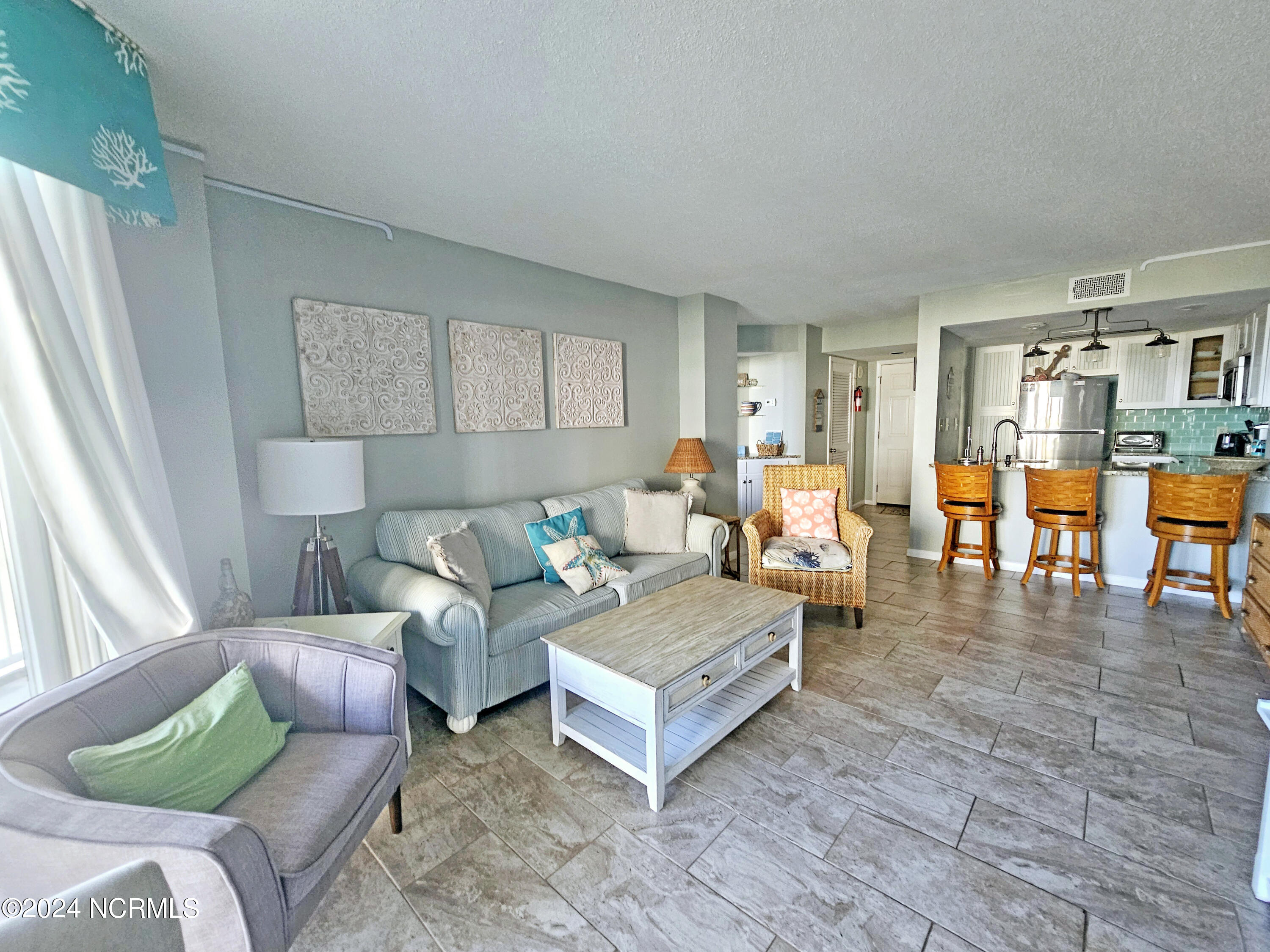 2000 New River Inlet Road, Unit 2212 North Topsail Beach, NC 28460 - Photo 6 of 22 Living room 3