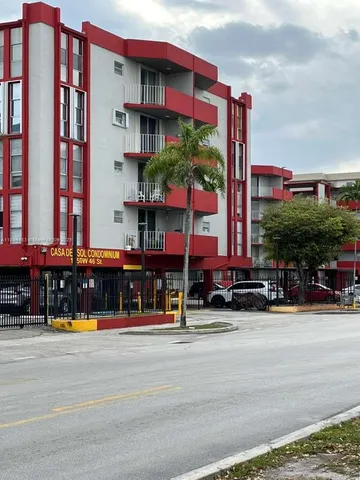 a street with a building and a street light