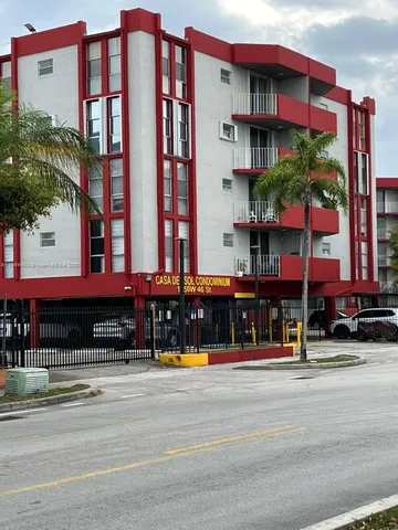 a view of a building with a street