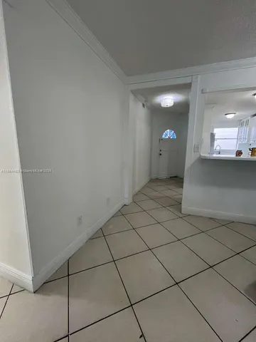 a view of a room with a washer and dryer