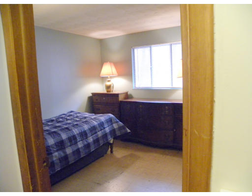 22 Donna Road Chelmsford, MA 01824 - Photo 11 of 13 a bedroom with a bed and a dresser in it