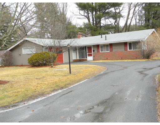 22 Donna Road Chelmsford, MA 01824 - Photo 2 of 13 a view of a house with snow on the road