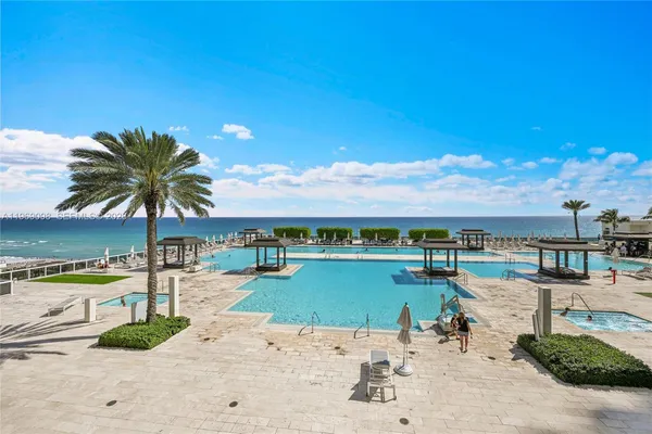 a view of a lake and a yard