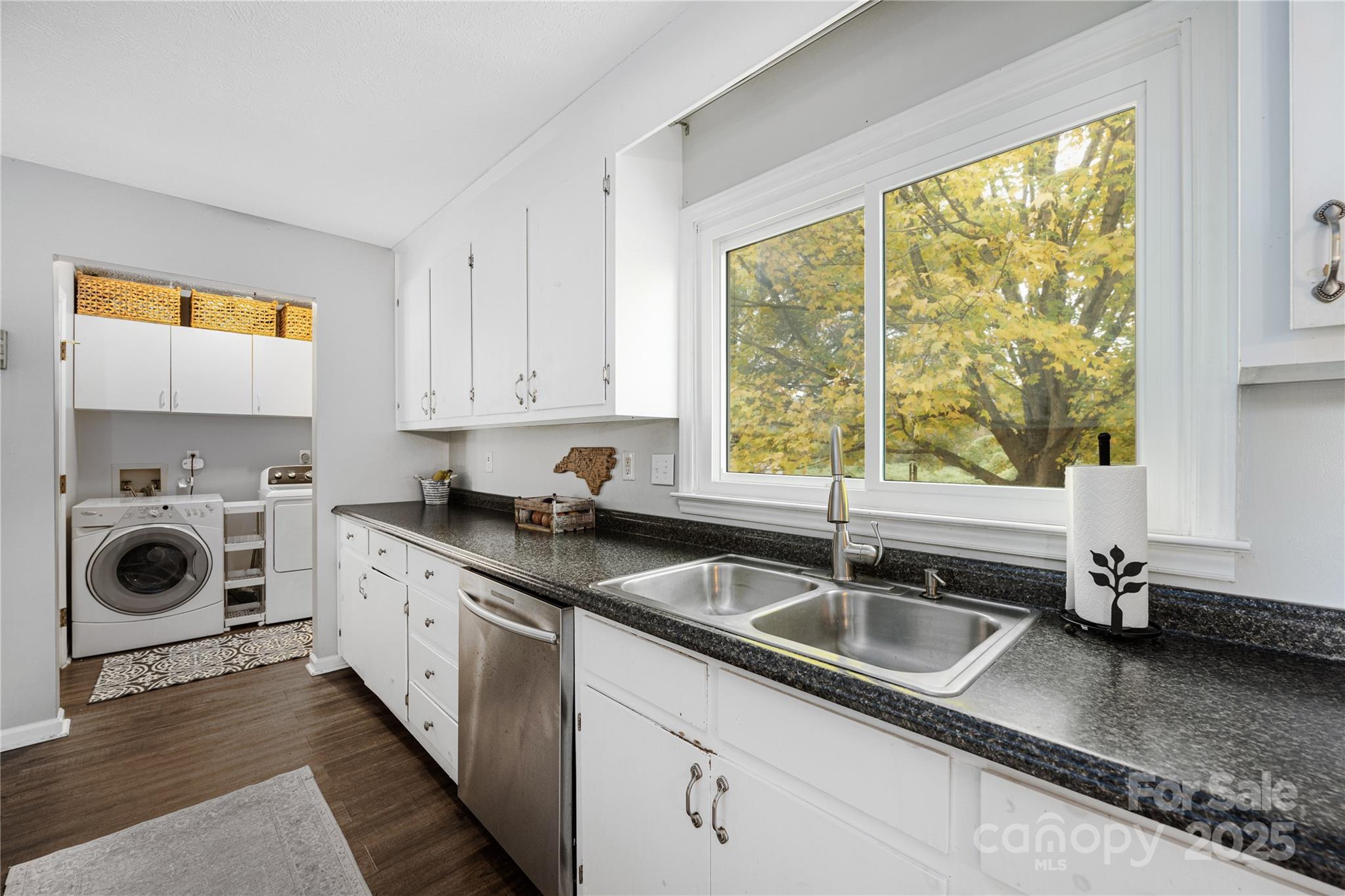 117 Clodfelter Road Mooresville, NC 28115 - Photo 14 of 39 a kitchen that has a sink and cabinets