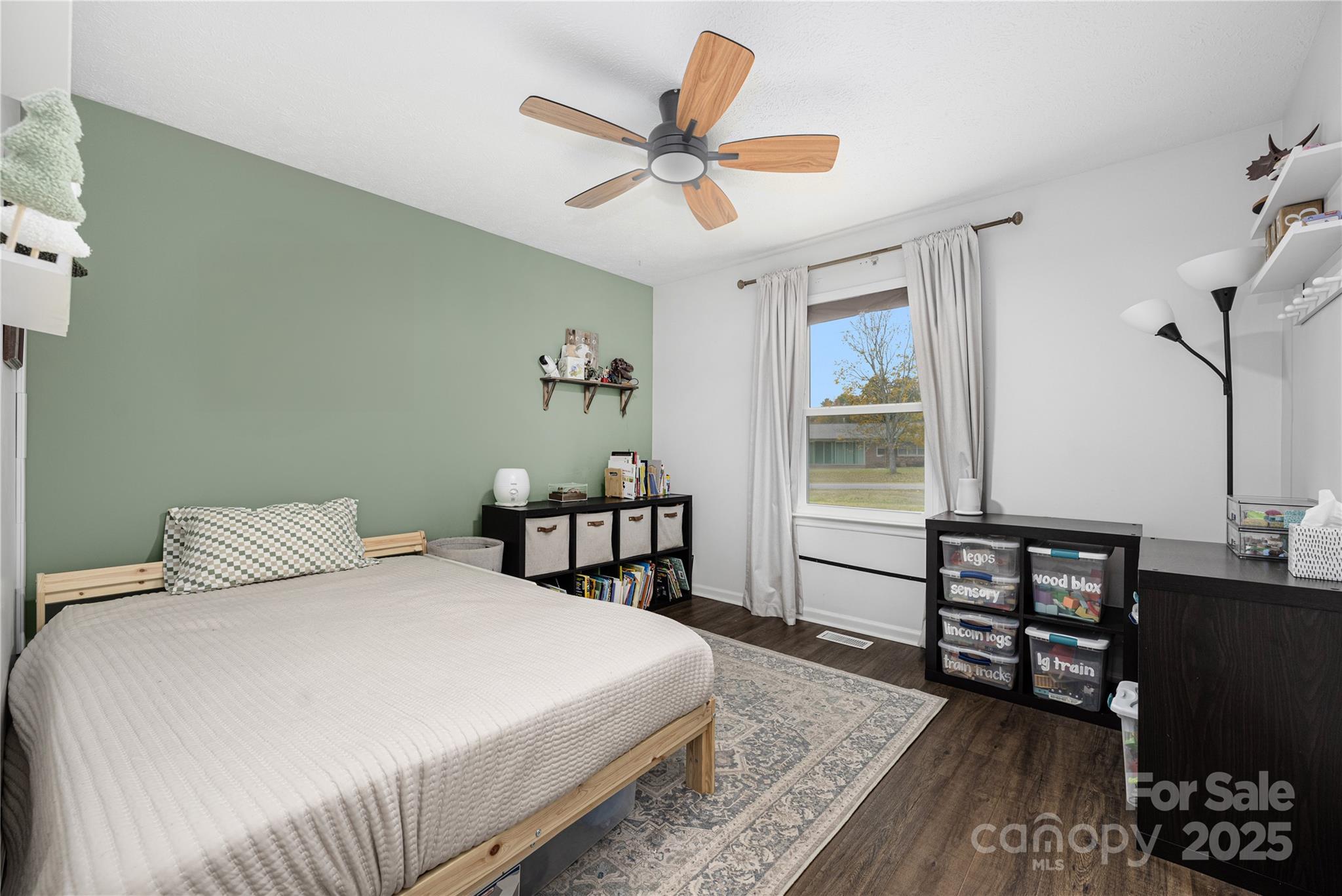 117 Clodfelter Road Mooresville, NC 28115 - Photo 21 of 39 a bedroom with a bed and a table in it