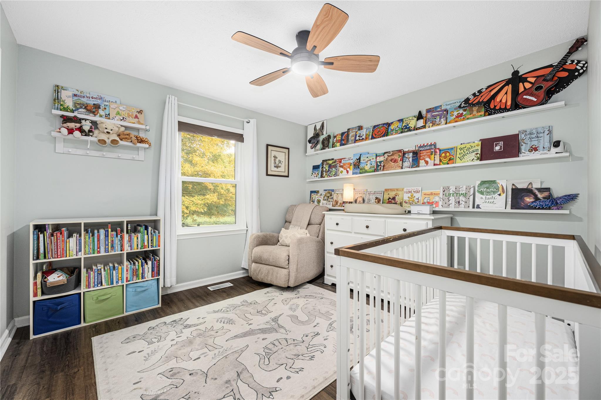 117 Clodfelter Road Mooresville, NC 28115 - Photo 24 of 39 a bedroom with furniture and a book shelf