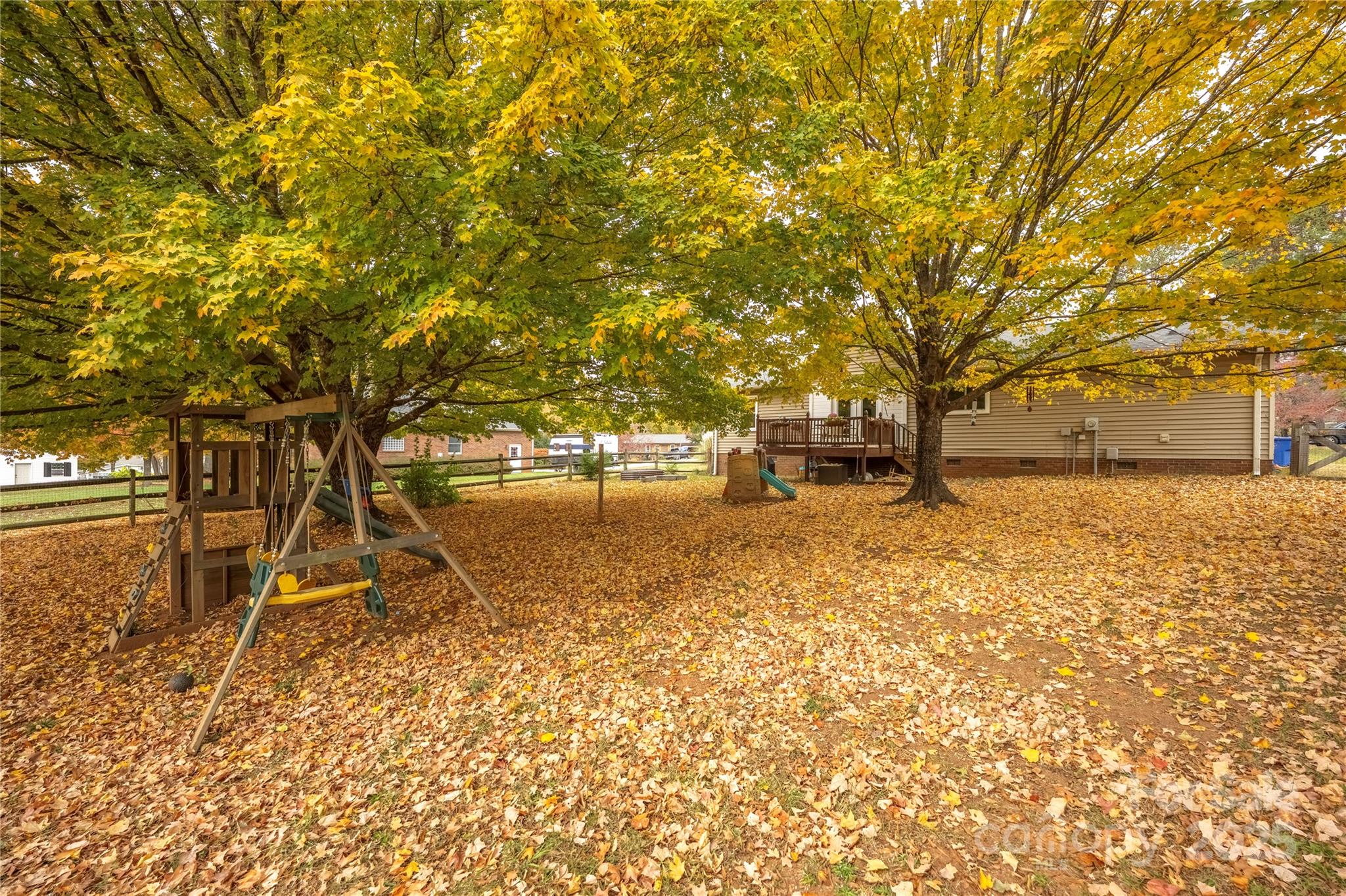 117 Clodfelter Road Mooresville, NC 28115 - Photo 39 of 39 a view of outdoor space with deck and a garden