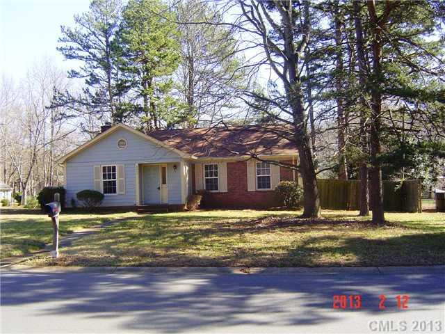 6212 Old Meadow Road Charlotte, NC 28227 - Photo 1 of 10 a house that has a tree in front of it