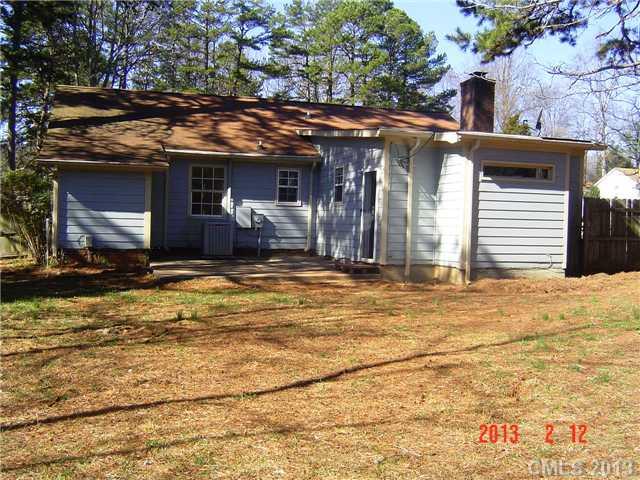 6212 Old Meadow Road Charlotte, NC 28227 - Photo 2 of 10 a view of a house with a patio