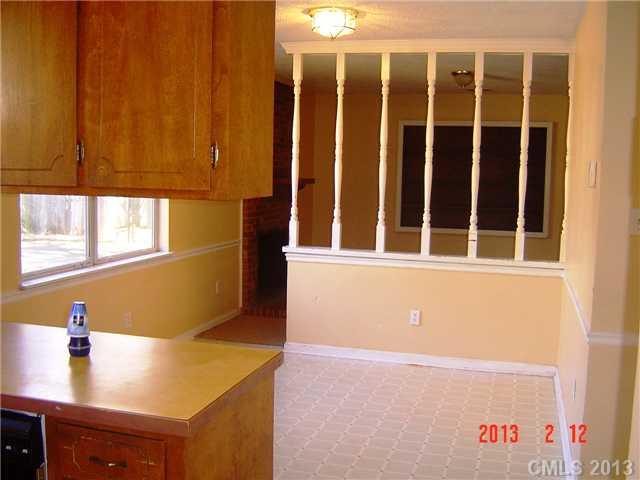 6212 Old Meadow Road Charlotte, NC 28227 - Photo 4 of 10 a view of kitchen with wooden floor and window