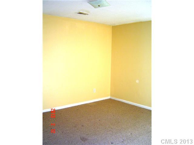 6212 Old Meadow Road Charlotte, NC 28227 - Photo 7 of 10 a view of a big room with windows