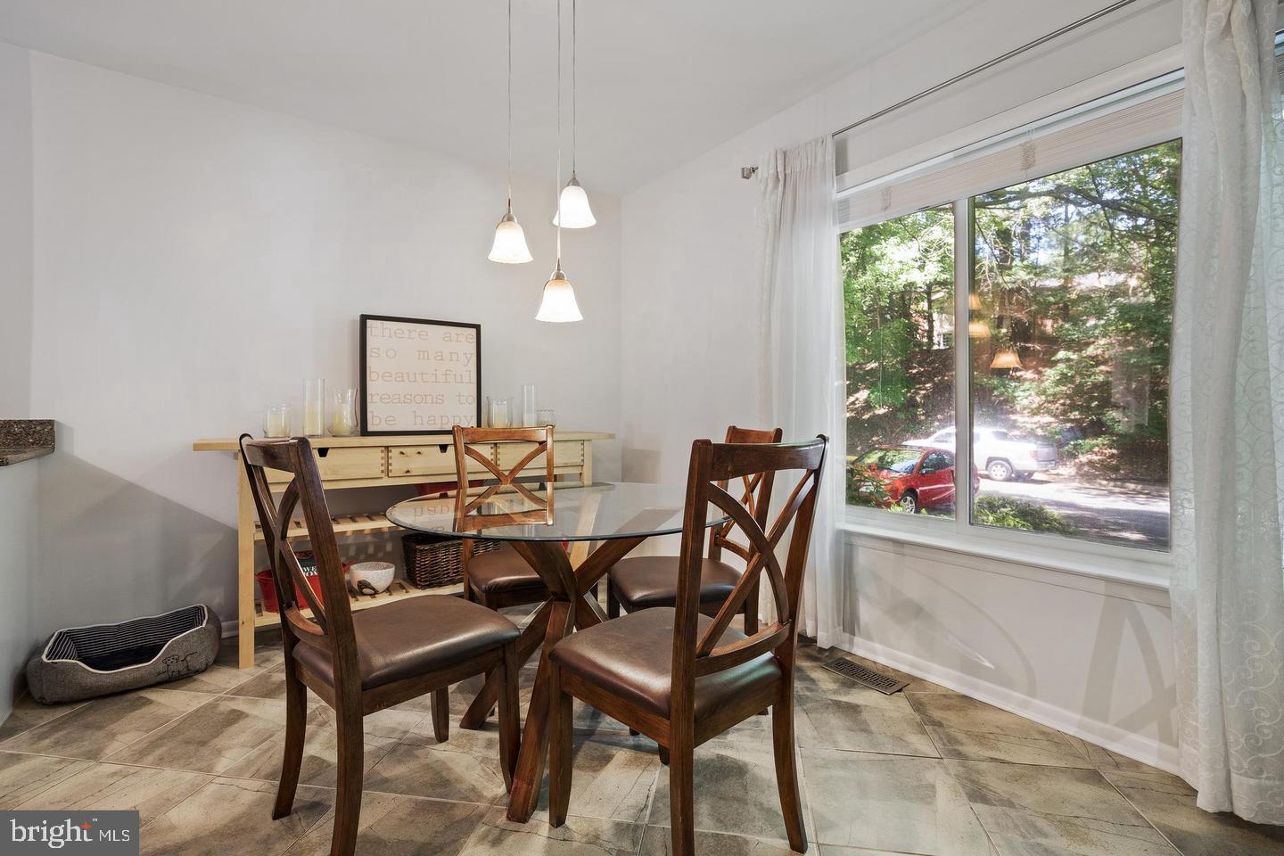 2343 Millennium Lane Reston, VA 20191 - Photo 14 of 34 Bright dining space with nature views.