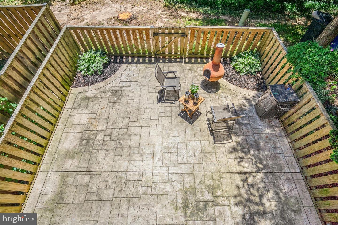2343 Millennium Lane Reston, VA 20191 - Photo 8 of 34 Charming patio retreat in nature's embrace.