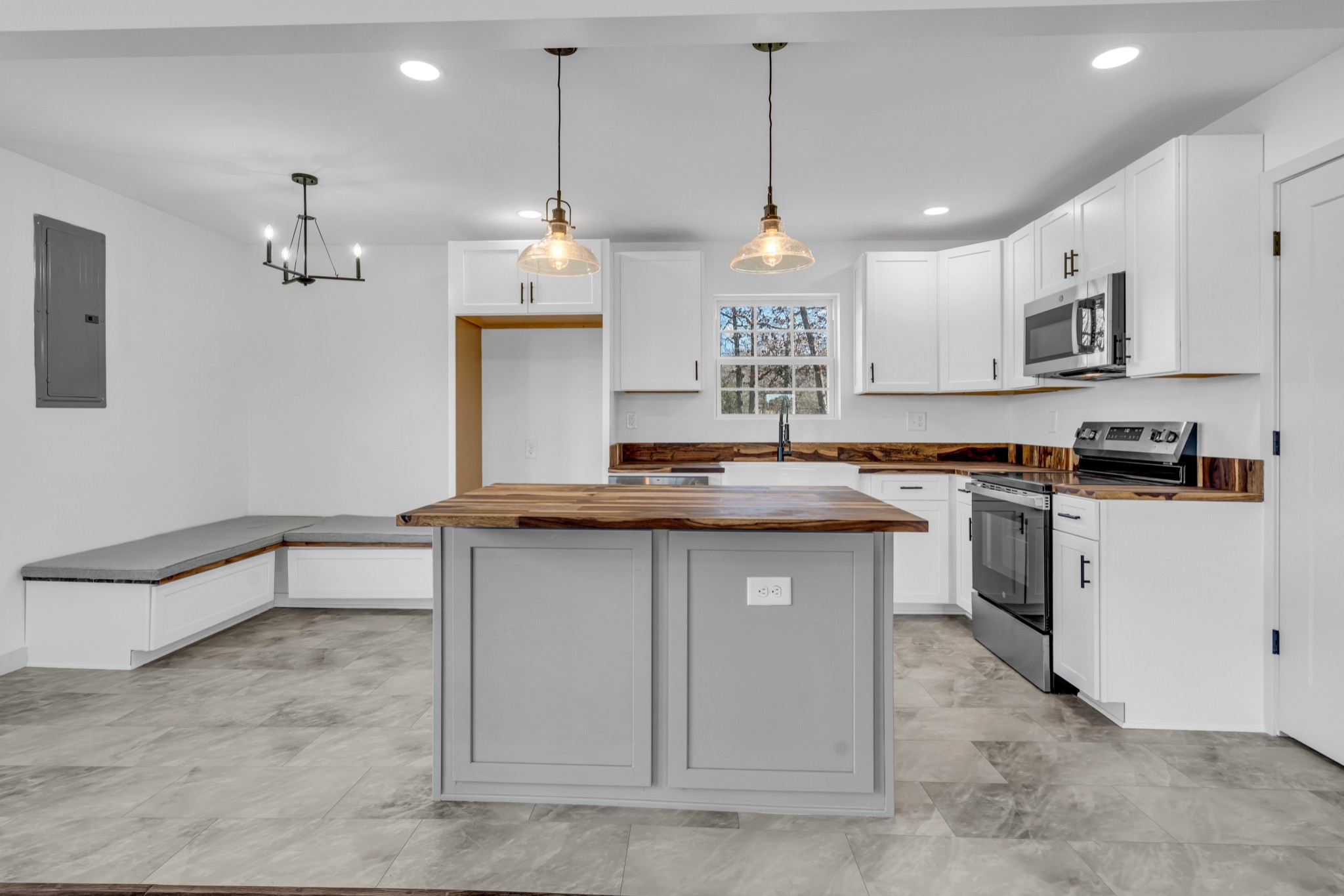 7159 C C C Road Fairview, TN 37062 - Photo 21 of 83 a kitchen with stainless steel appliances granite countertop a stove a sink and a refrigerator