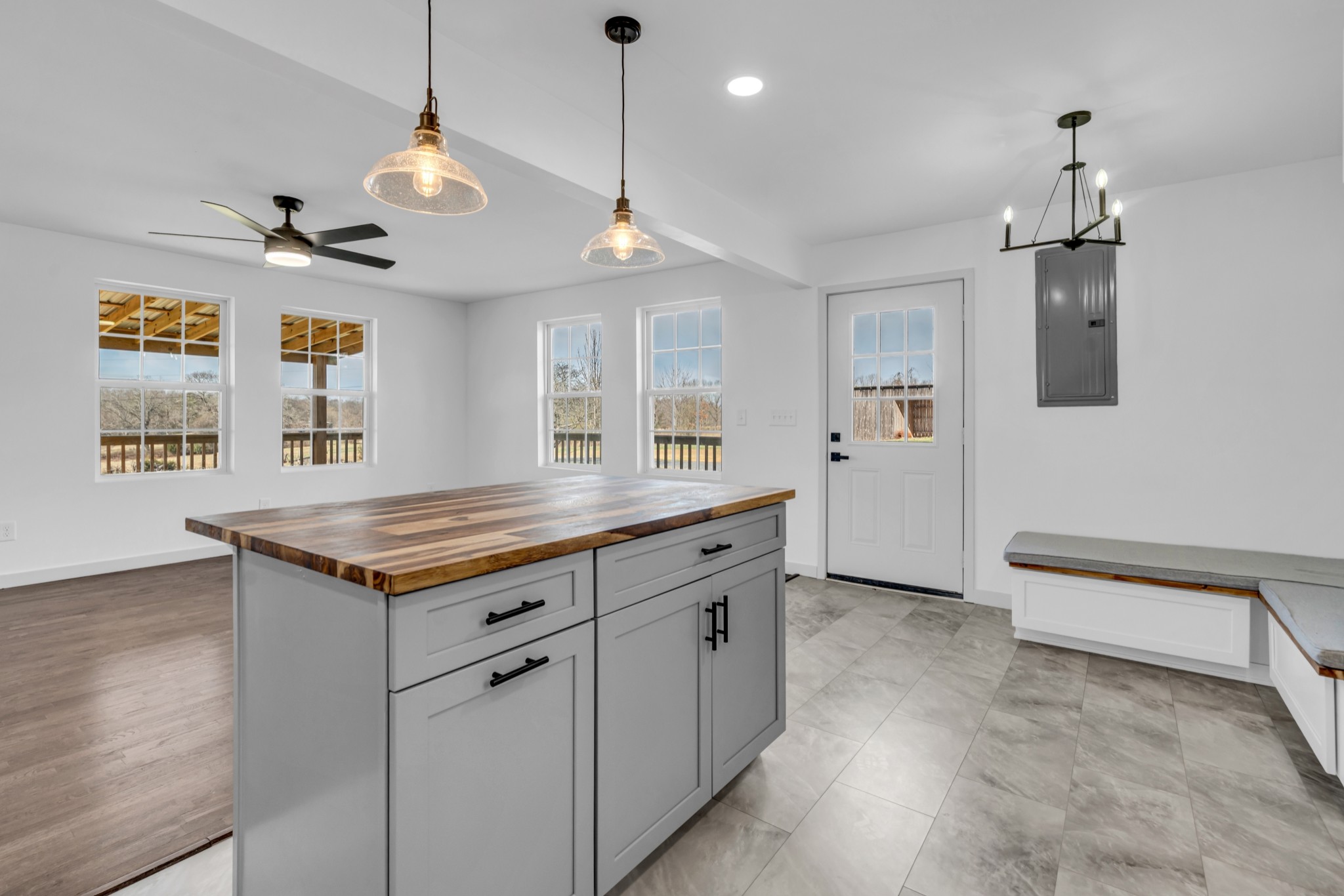 7159 C C C Road Fairview, TN 37062 - Photo 23 of 83 a spacious kitchen with stainless steel appliances granite countertop a stove and a wooden floors