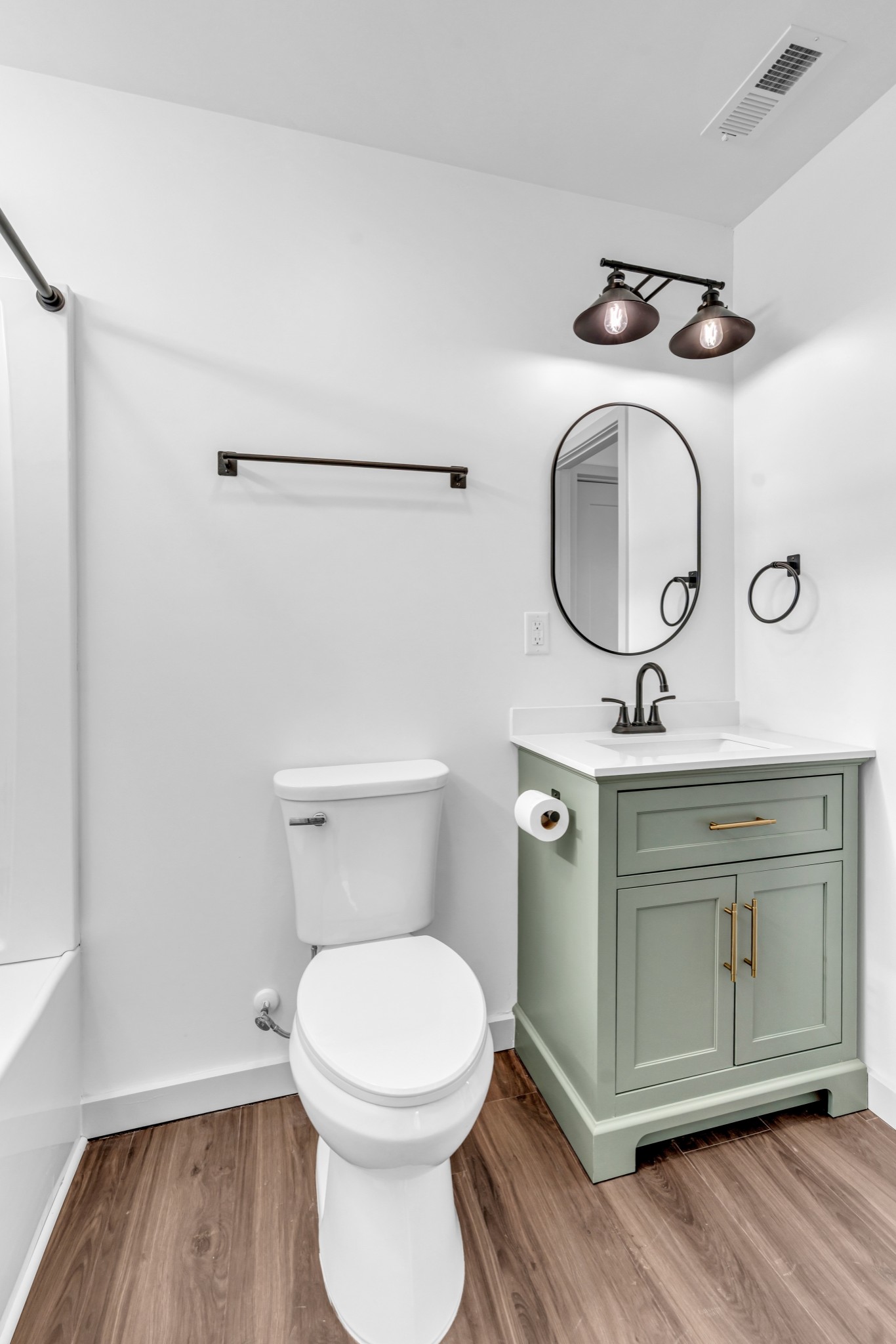 7159 C C C Road Fairview, TN 37062 - Photo 62 of 83 a bathroom with a granite countertop toilet sink and mirror