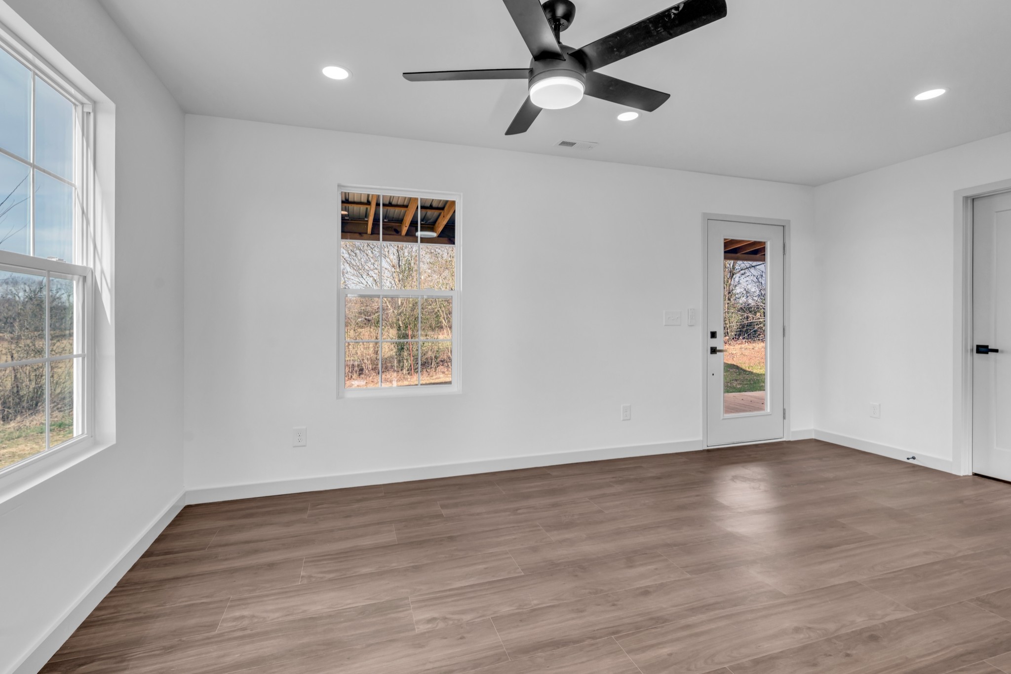 7159 C C C Road Fairview, TN 37062 - Photo 68 of 83 wooden floor in an empty room with a window
