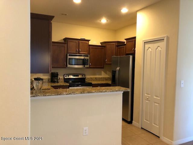 3731 Funston Circle Melbourne, FL 32940 - Photo 14 of 34 Kitchen with pantry