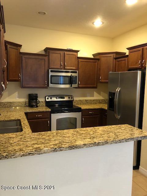 3731 Funston Circle Melbourne, FL 32940 - Photo 15 of 34 Side by side refrigerator