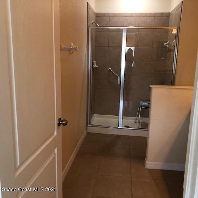 3731 Funston Circle Melbourne, FL 32940 - Photo 18 of 29 a bathroom with a shower and a sink