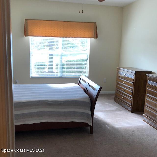 3731 Funston Circle Melbourne, FL 32940 - Photo 18 of 34 Master Bedroom with Lake Views