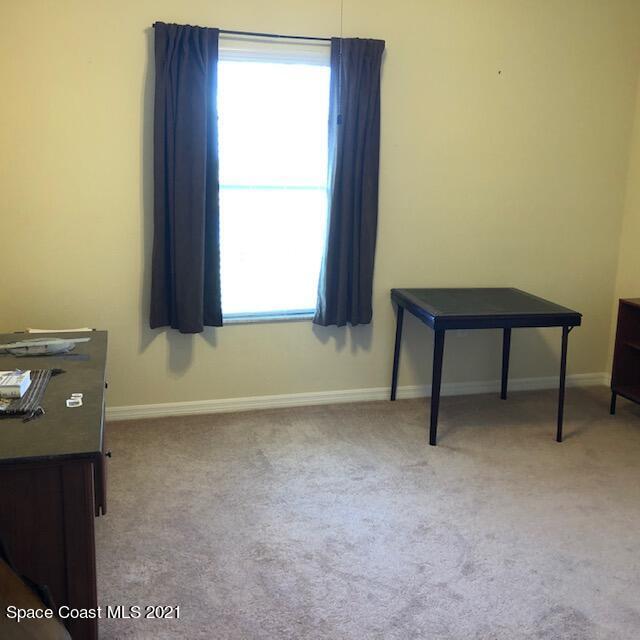 3731 Funston Circle Melbourne, FL 32940 - Photo 24 of 29 a view of an empty room with a window