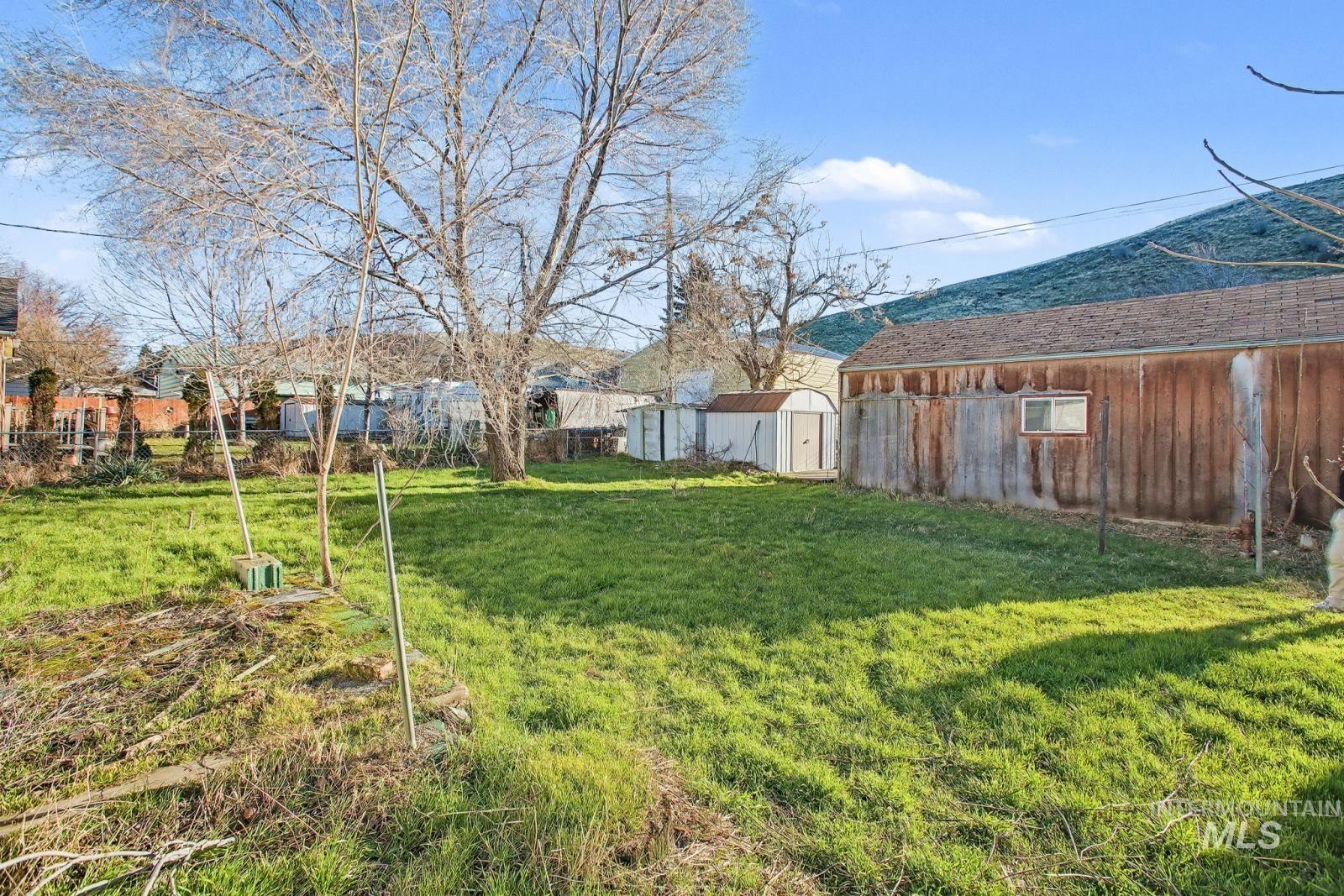 332 High Street Pomeroy, WA 99347 - Photo 18 of 23 View of yard featuring a storage shed