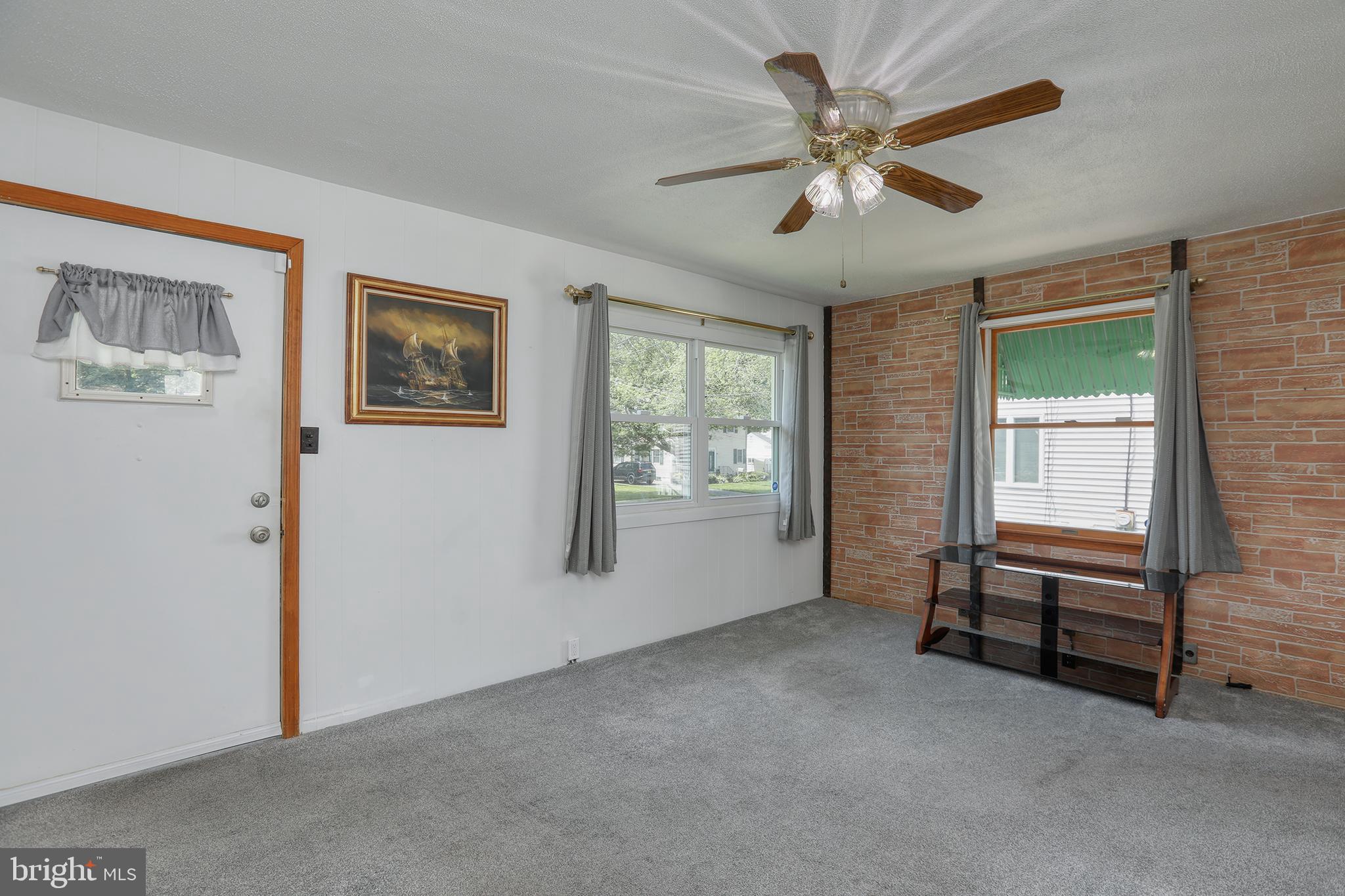 183 Franklyn Road Ewing, NJ 08628 - Photo 2 of 20 a view of an empty room with a window