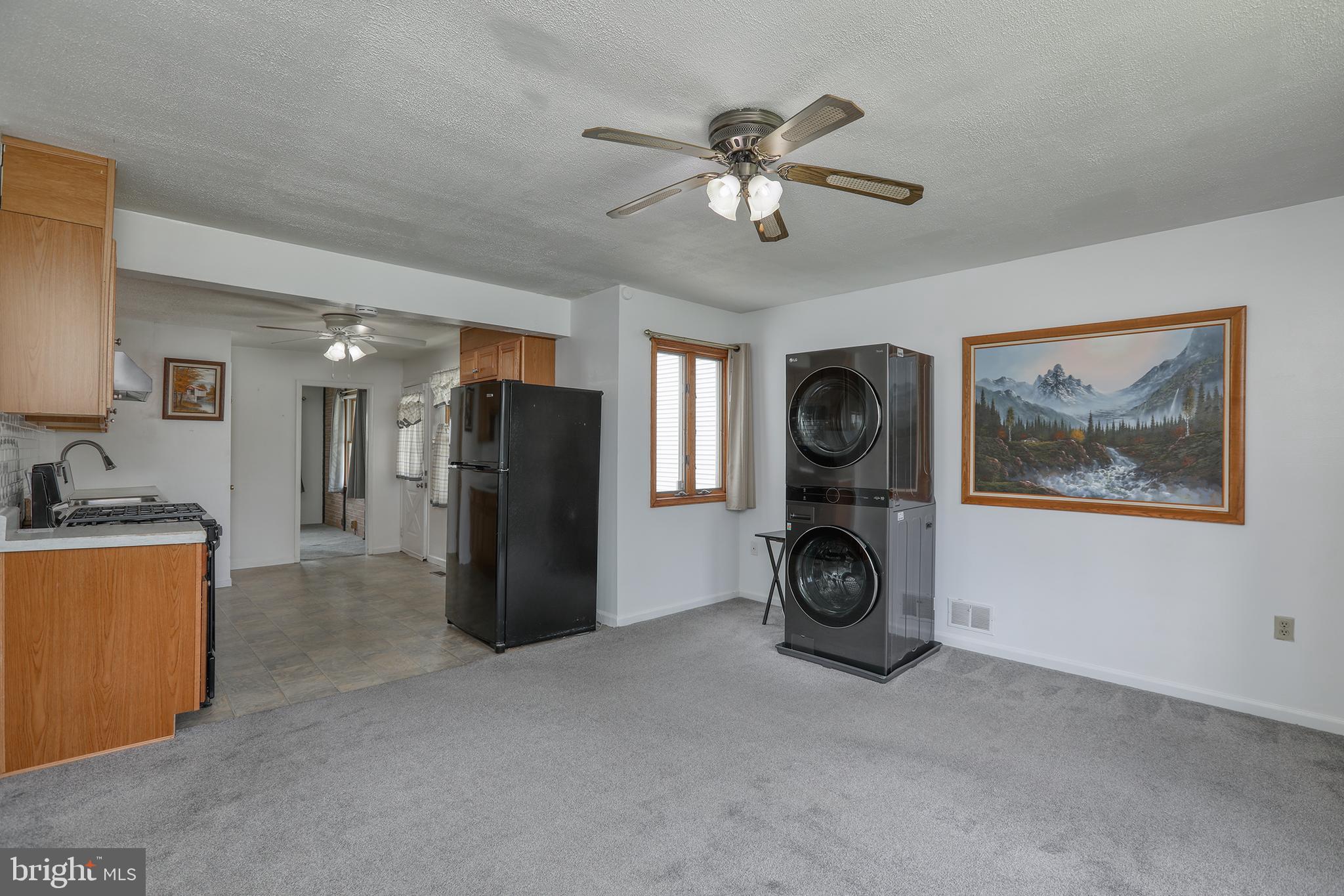 183 Franklyn Road Ewing, NJ 08628 - Photo 6 of 20 a view of an empty room with a fireplace