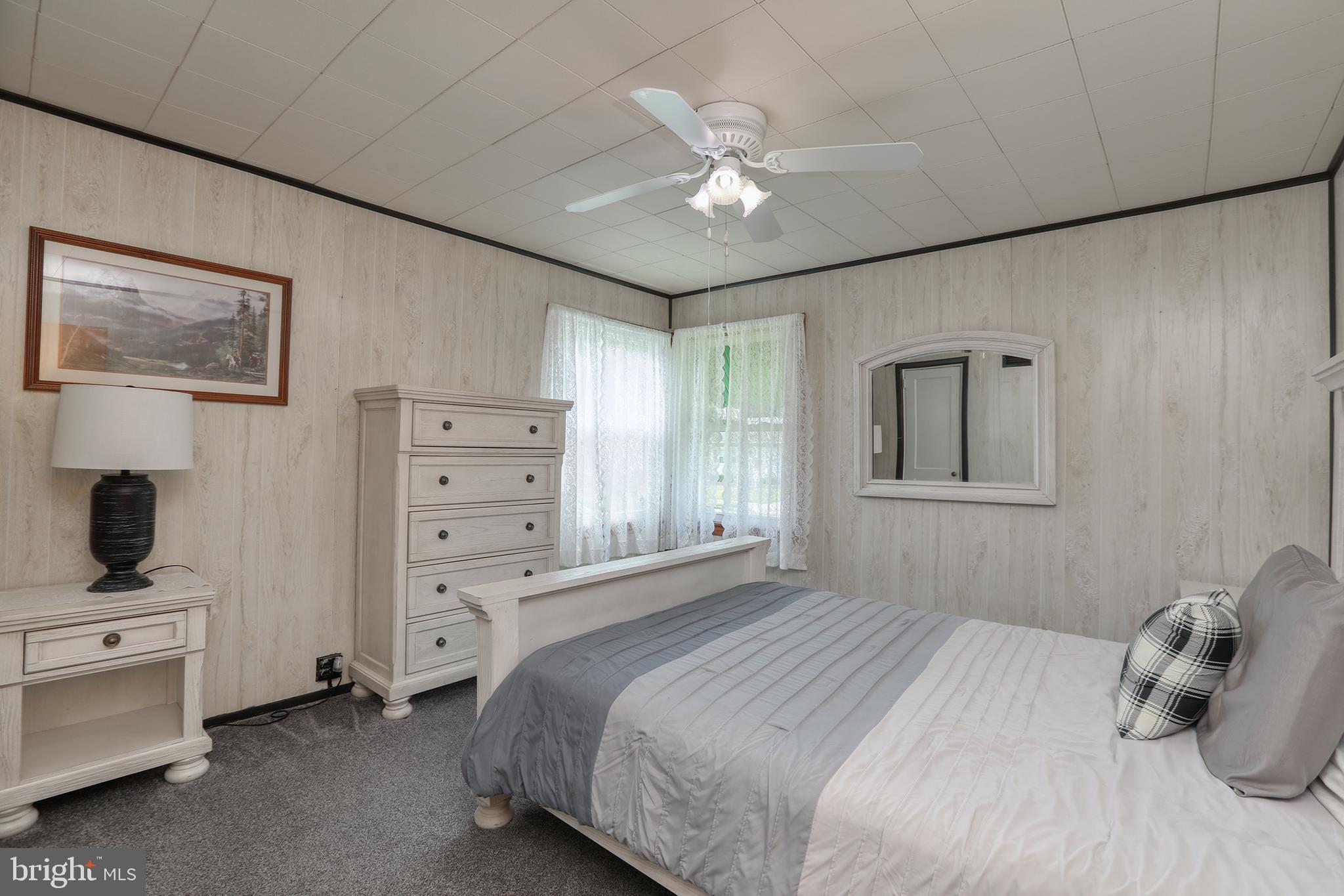 183 Franklyn Road Ewing, NJ 08628 - Photo 10 of 20 a bedroom with a bed and a window