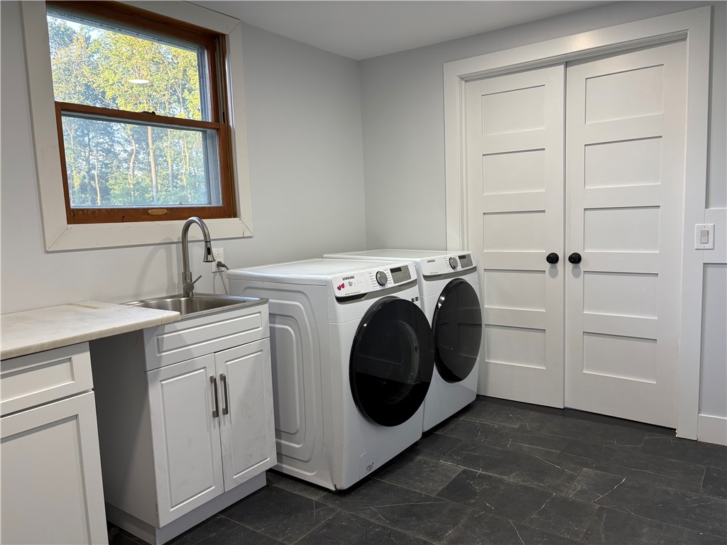 4073 Warner Road Marion, NY 14505 - Photo 23 of 46 Large laundry room